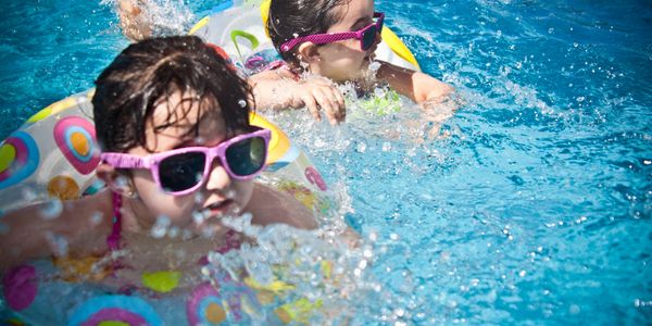 Girl Swimming Pool Water Sunglasses kids splashing charlotte cornelius mooresville denver service