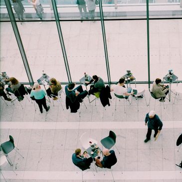 birds eye view of a business building lunch and meeting room.