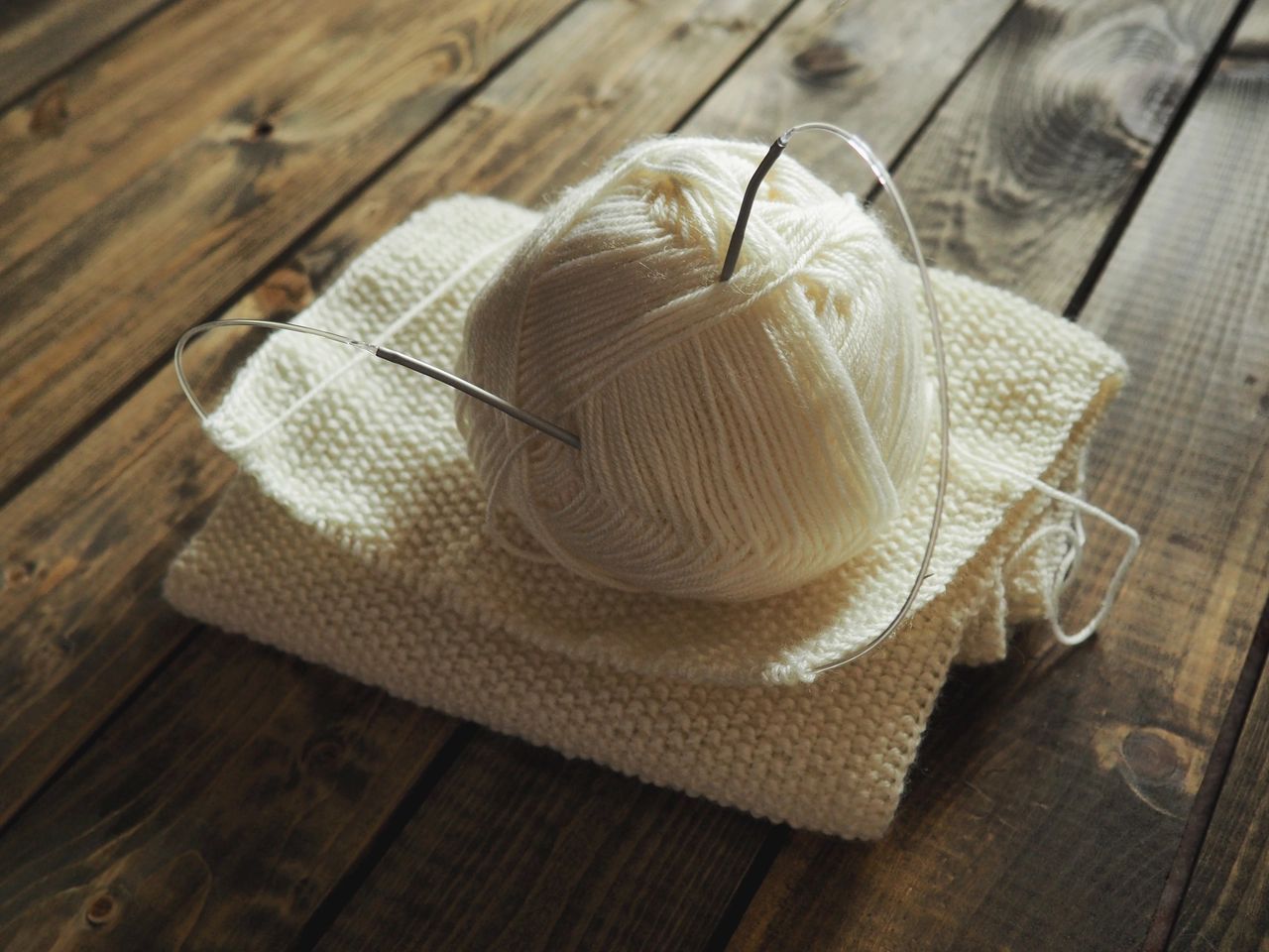 Image of knitting needles and ball of wool