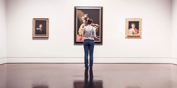 person looking at art
