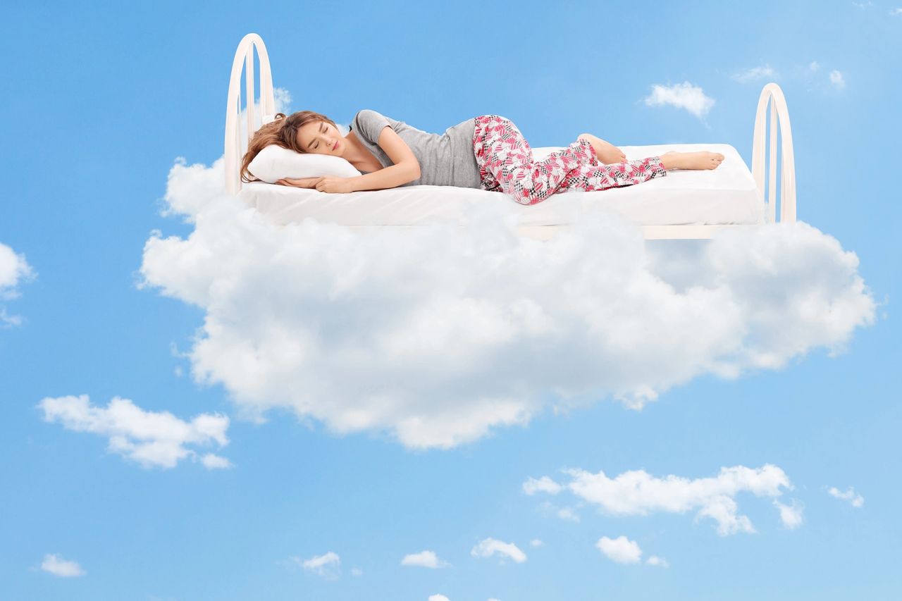 Woman sleeping on the cloud