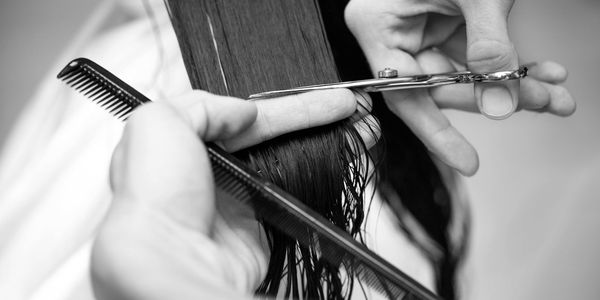 Lady getting haircut