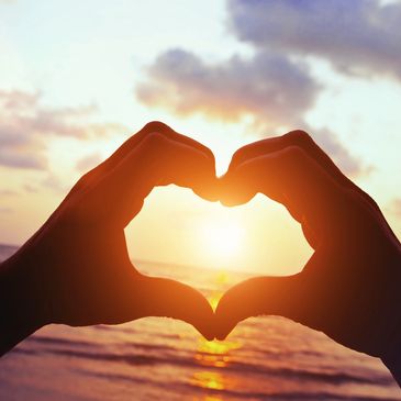 Hands doing a heart shape