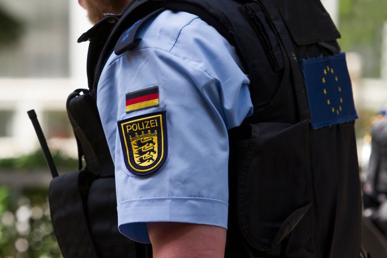 Close-up of a German police officer's uniform with Polizei patch.