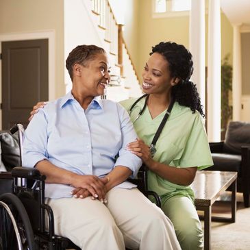 Occupational Therapist assisting woman in a wheelchair with activities of daily living home remodel