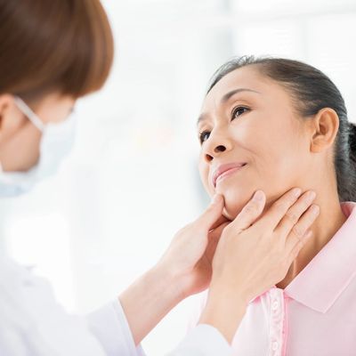 Private nurse checkig thyroid in Bristol