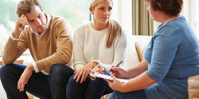 Couple talking to counselor