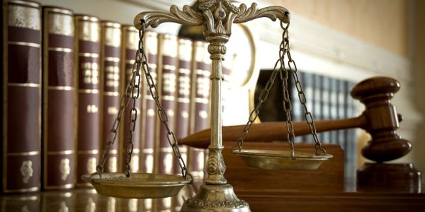 Law Books, Scales of Justice, and Gavel
