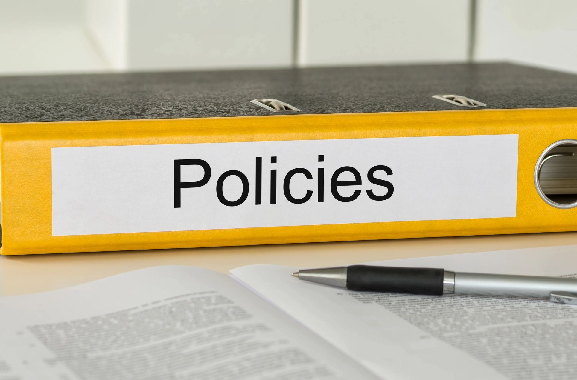 A folder with the label ‘policies on’