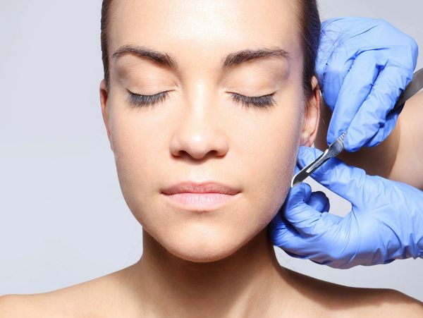 young woman prepare for a cosmetic treatment. iv drip therapy