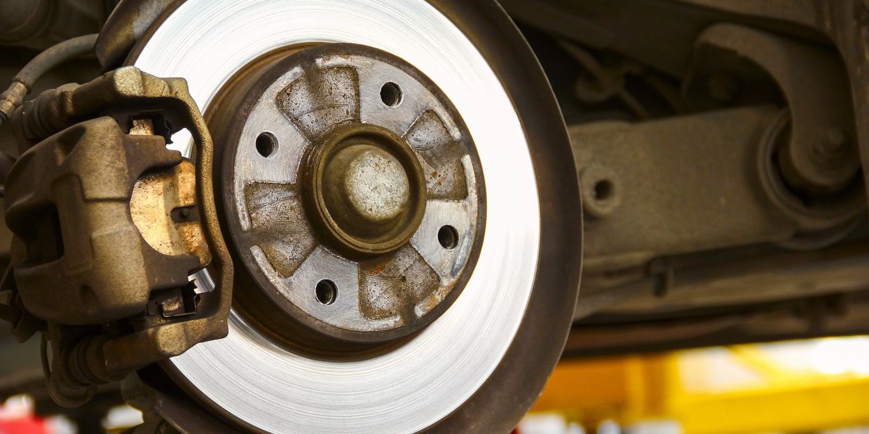 Close-up of a car's brake disc and caliper.