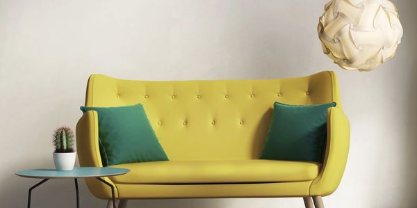Cozy living room with modern sofa and accent chair