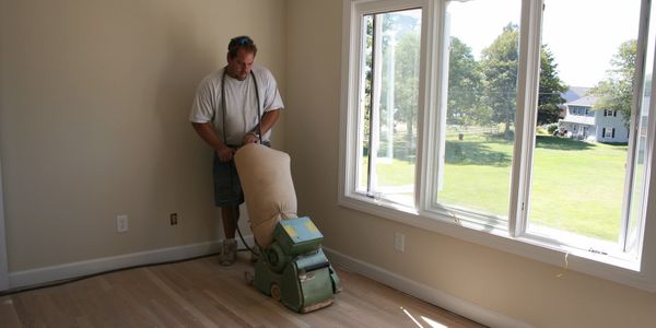 Refinishing a hardwood floor prior to stain and polyurethane finish