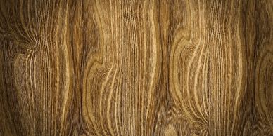 Close-up of textured brown wood grain patterns.