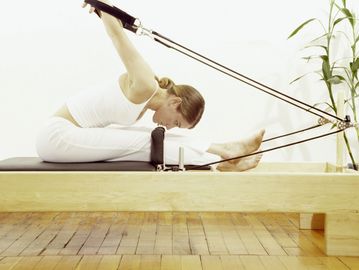 Woman on the Pilates Reformer 
