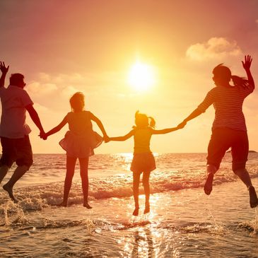 a family having fun on holiday at the beach