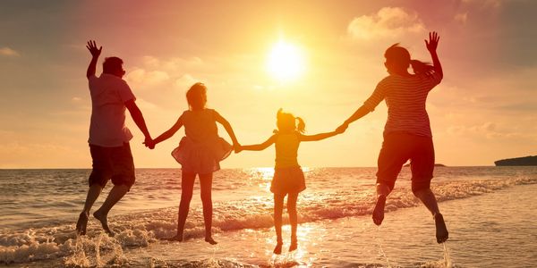 family balance joy nutritional wellbeing sunset on beach