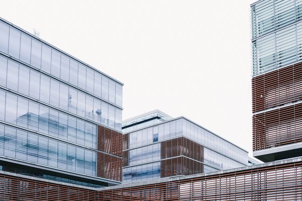 Modern glass and metal office buildings with a minimalist design.