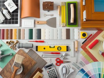 Various home improvement tools and materials arranged neatly.