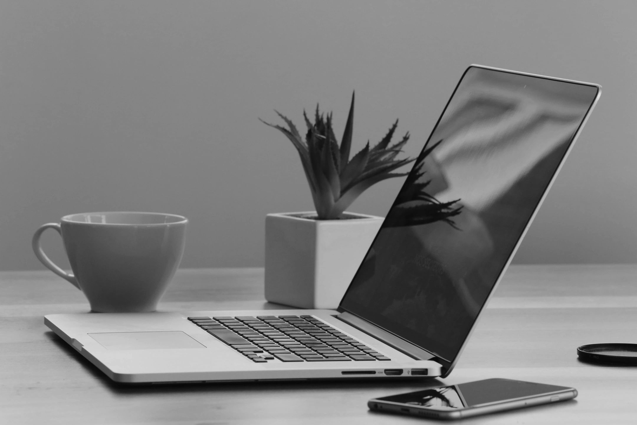 Laptop computer, mobile phone, and coffee mug