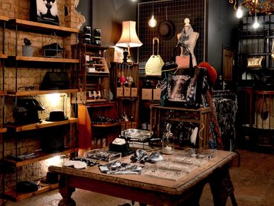 A cozy boutique with vintage decor and accessories.