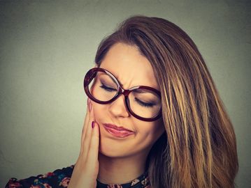 Woman with jaw pain