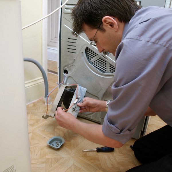 Technician dryer repair