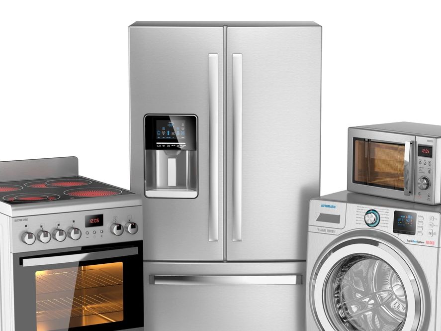 A set of modern stainless steel home appliances including a stove, refrigerator, washing machine, and microwave.