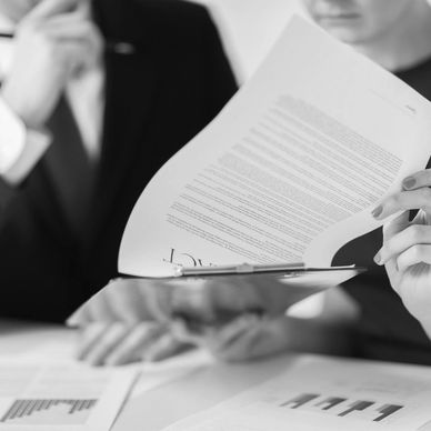 Woman reviewing a documents with a man