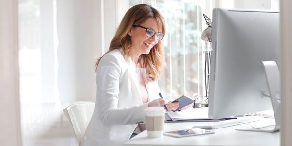 Professional woman working at a computer