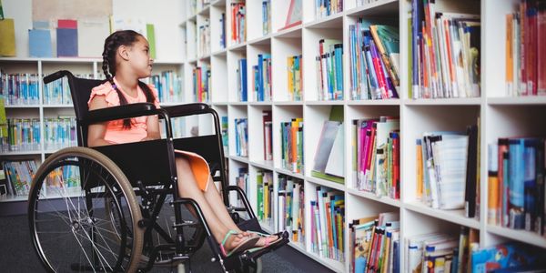 Special needs child at a library