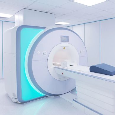 Modern MRI machine in a clean medical room.