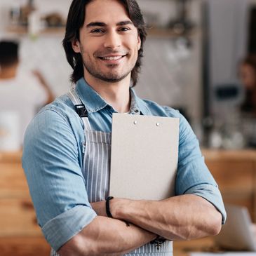 A man holding a clipboard