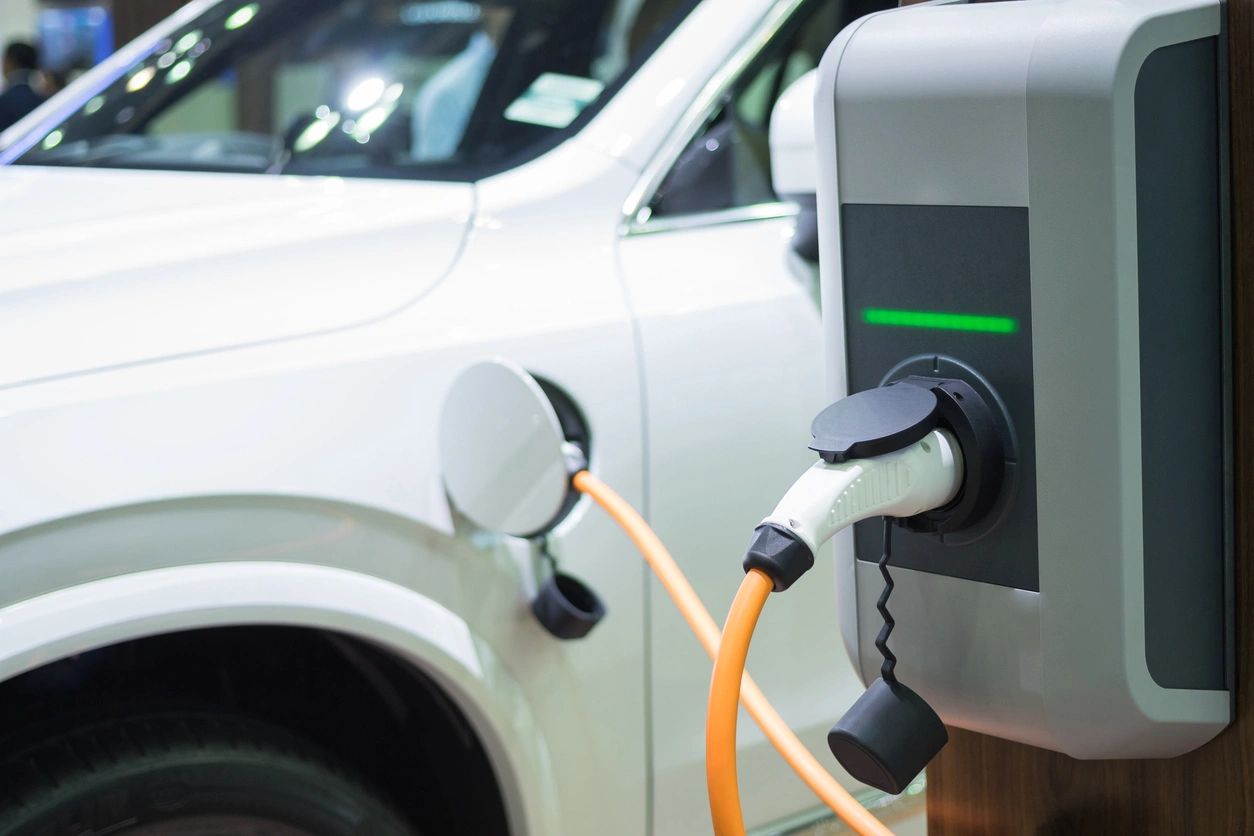 Electric vehicle charging at a wallbox EV charger installed by Prime London Installations