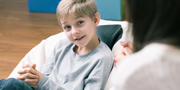 A child enjoys talking to his therapist at his own home, a service provided by Southside Counseling.