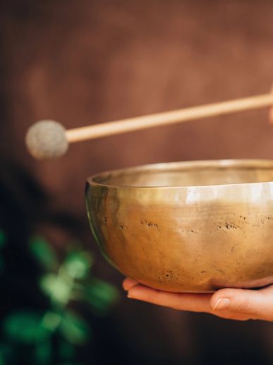 Sound bowl used for healing energetic field in holistic psychotherapy