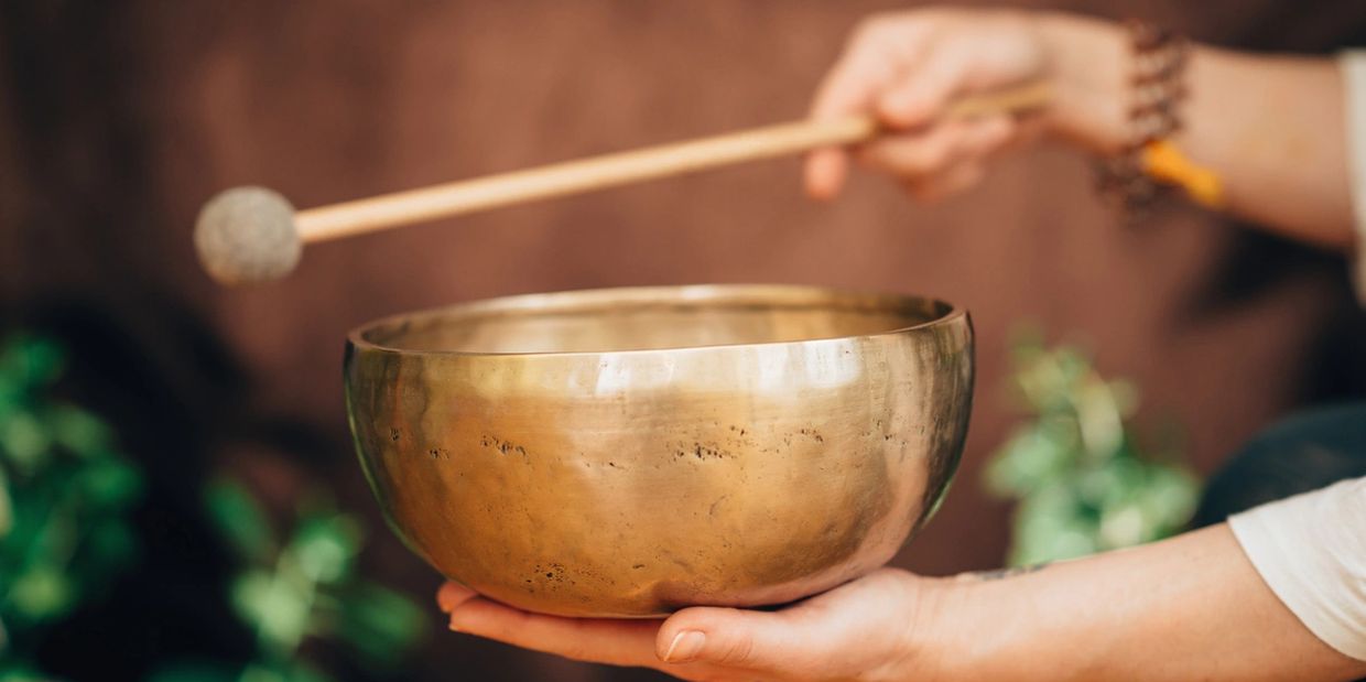 Tibetan singing bowl being played.