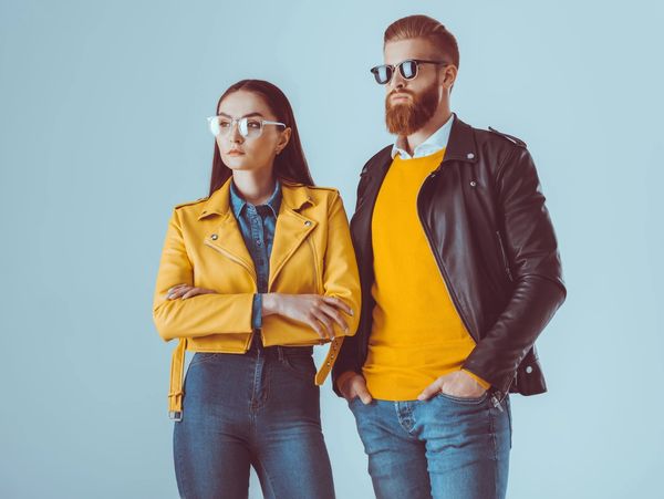 a man and a woman wearing glasses.