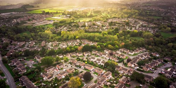 A birds eye view of a UK area populated by many houses