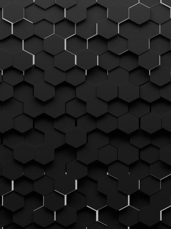 Pattern of black hexagonal tiles with depth effect.
