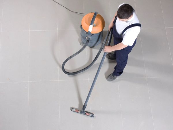 a professional cleaning the floors