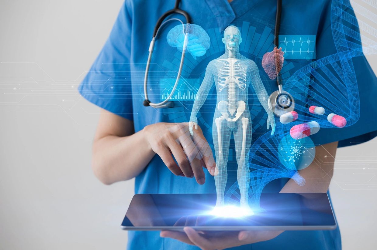 Doctor interacting with a digital hologram of the human body.