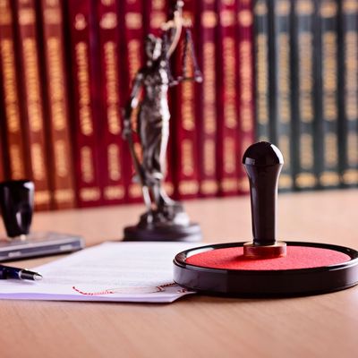 Court stamp and statute in a law library in preparation for reviewing a guardianship petition