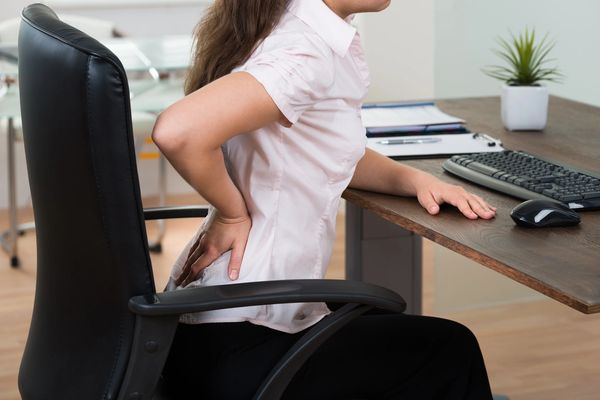 low back pain due to work chair and poor ergonomics