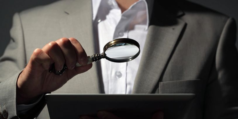 licensed private investigator conducting background investigation