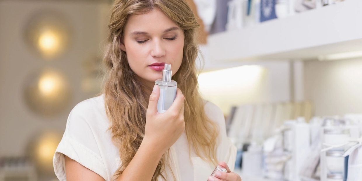 woman smelling hair products