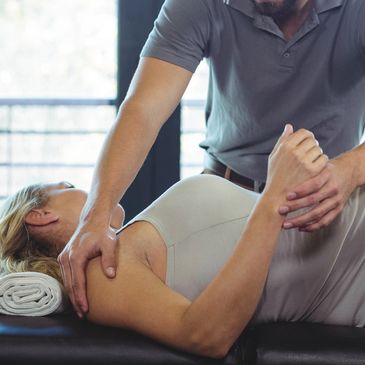 Sports massage for muscle recovery in client’s home in Hanwell