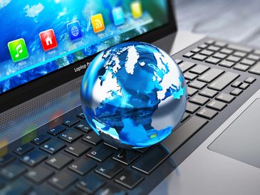 Image of a World Ball on a Laptop