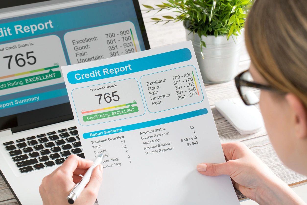 A first time home buyer pulls and reviews their credit report.