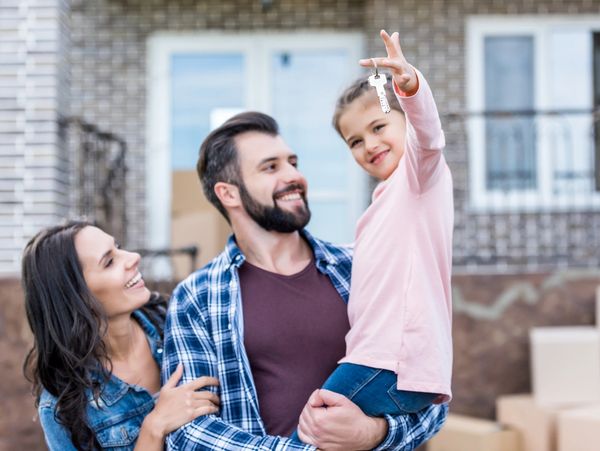 Happy Tenants with the keys to their new home